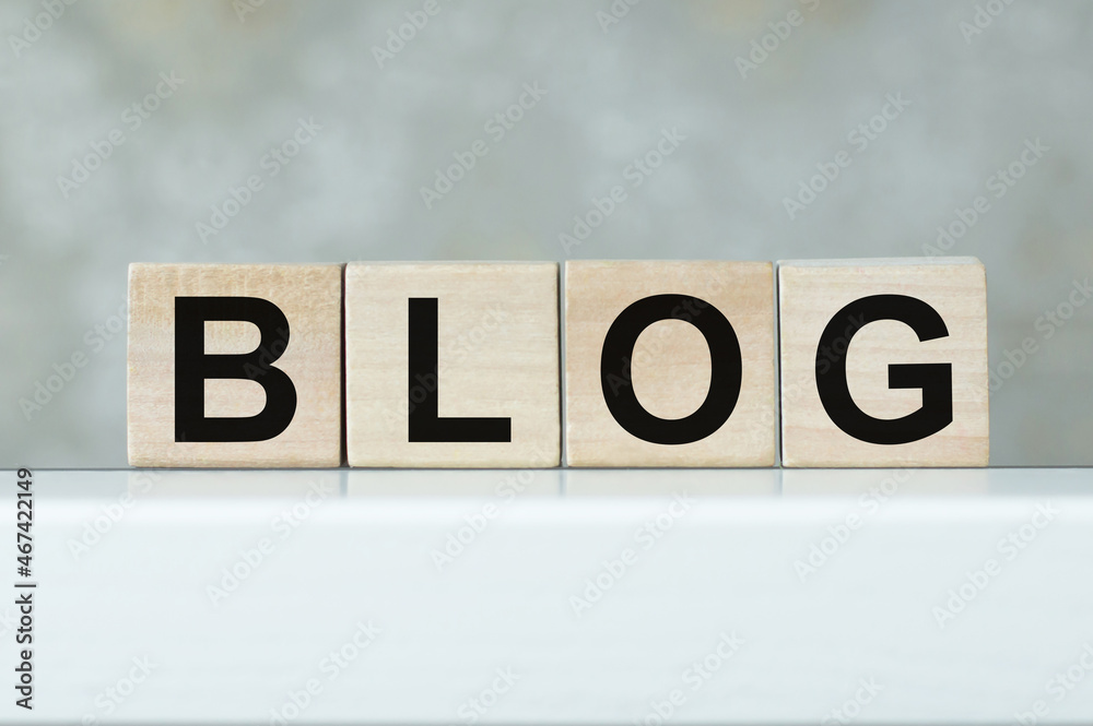 Wooden blocks with text BLOG on wood white table. Wooden blocks with text BLOG on wood white table.