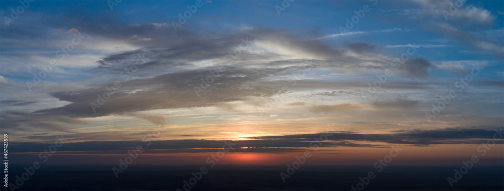 Abstraction of blurred clouds in the sky at sunset.