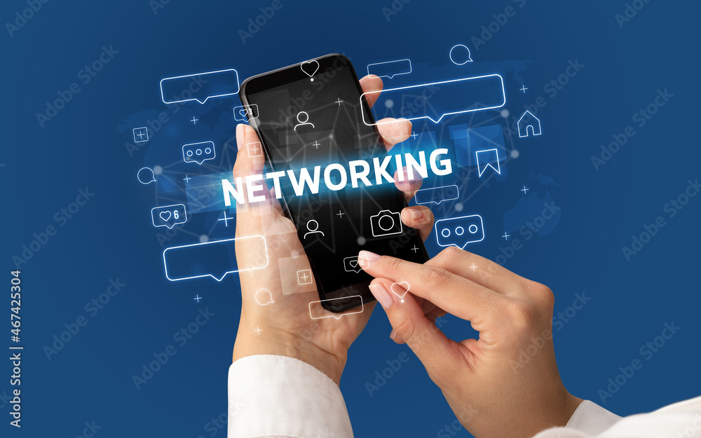 Hand using smartphone with social media concept Hand using smartphone with social media concept