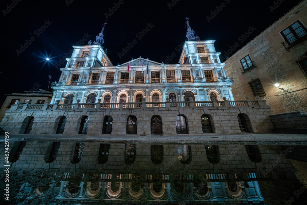 Wide Angle View of the Toledo City Hall Buidling with Bright Moon on the Sky
