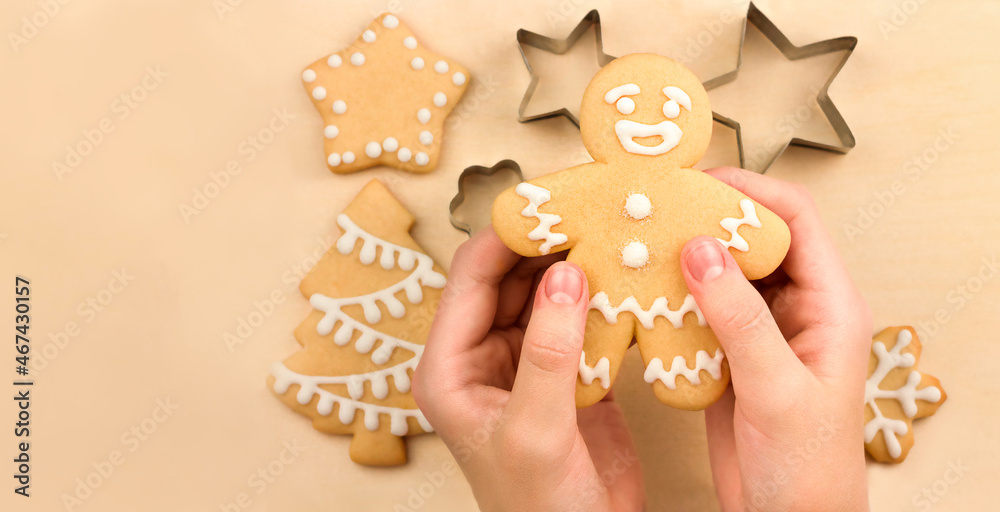 Child making homemade cristmas cookies.