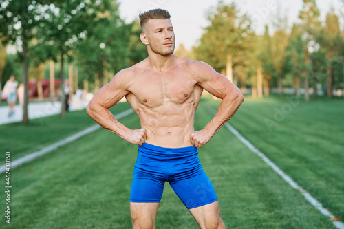 Muscled Man Doing Exercises Outdoor Fitness Summer