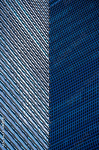 High glass skyscrapers on the streets of Singapore. Office windows background, closeup