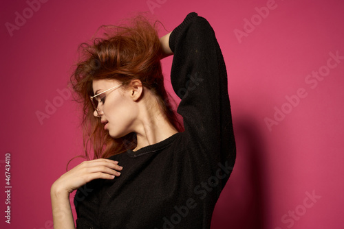 beautiful woman fashionable hairstyle sunglasses posing pink background © VICHIZH