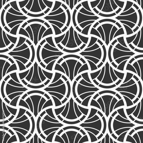 Art Deco seamless pattern. Geometric lattice texture. Quatrefoils. Maroccan scales mosaic tiles. Scallop filled shapes, rounded shapes. Traditional oriental pattern. Vector monochrome illustration. 