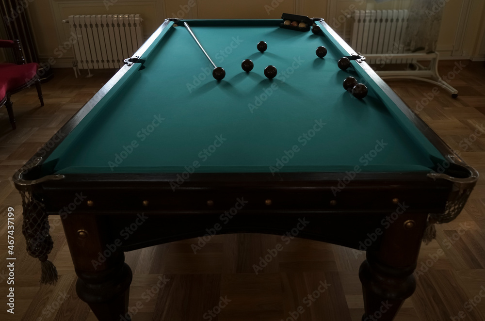  billiard balls on a table with green mat. The balls are placed to start the game. - obrazy, fototapety, plakaty 