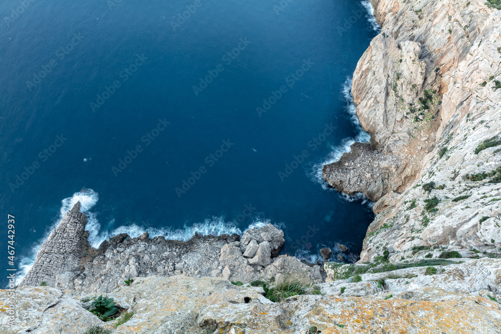Vertical seascape down the cliff at Mirador es Colomer, Mallorca