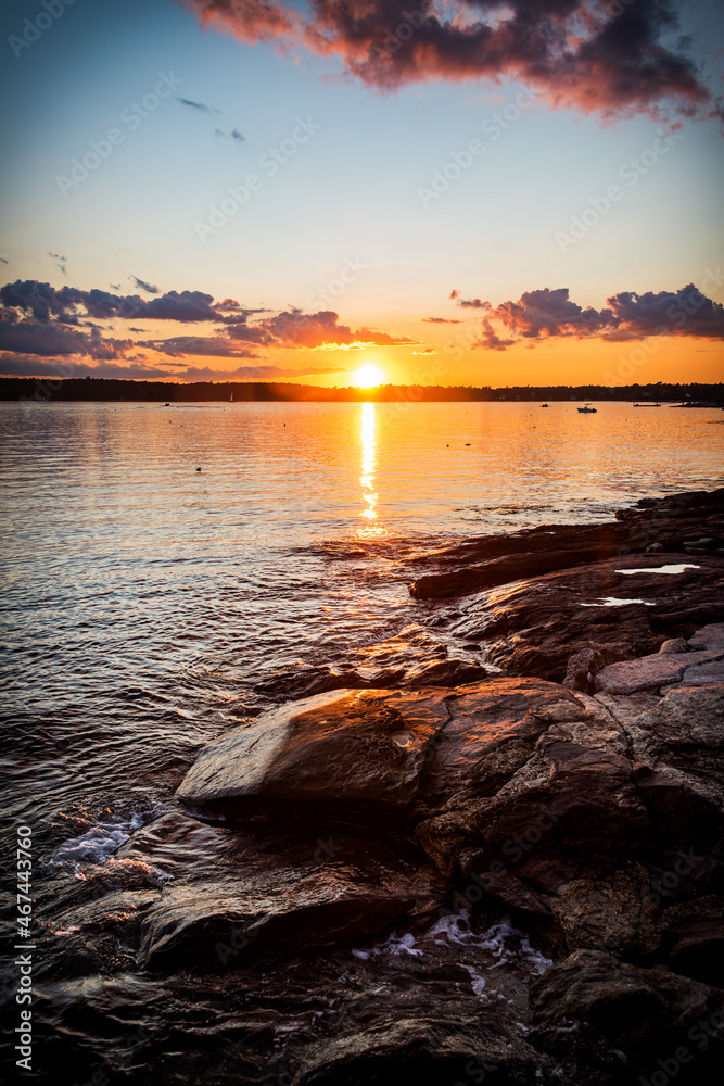 Sunset over rocky shoreline in southern coastal Maine near Boothbay Harbor