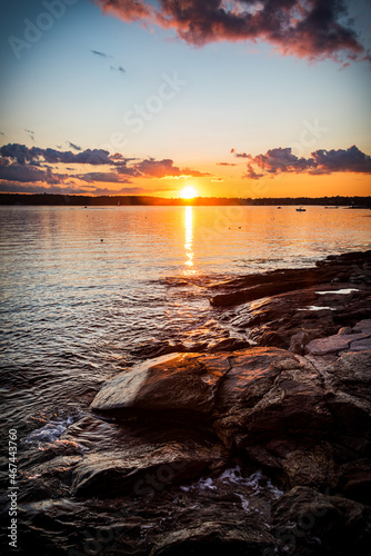 Sunset over rocky shoreline in southern coastal Maine near Boothbay Harbor