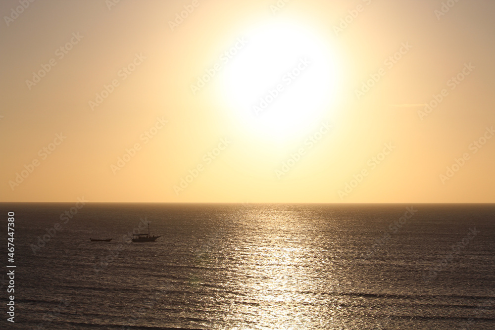 Boat against the light of the sunset in Jericoacoara. Boat against the light of the sunset in Jericoacoara.