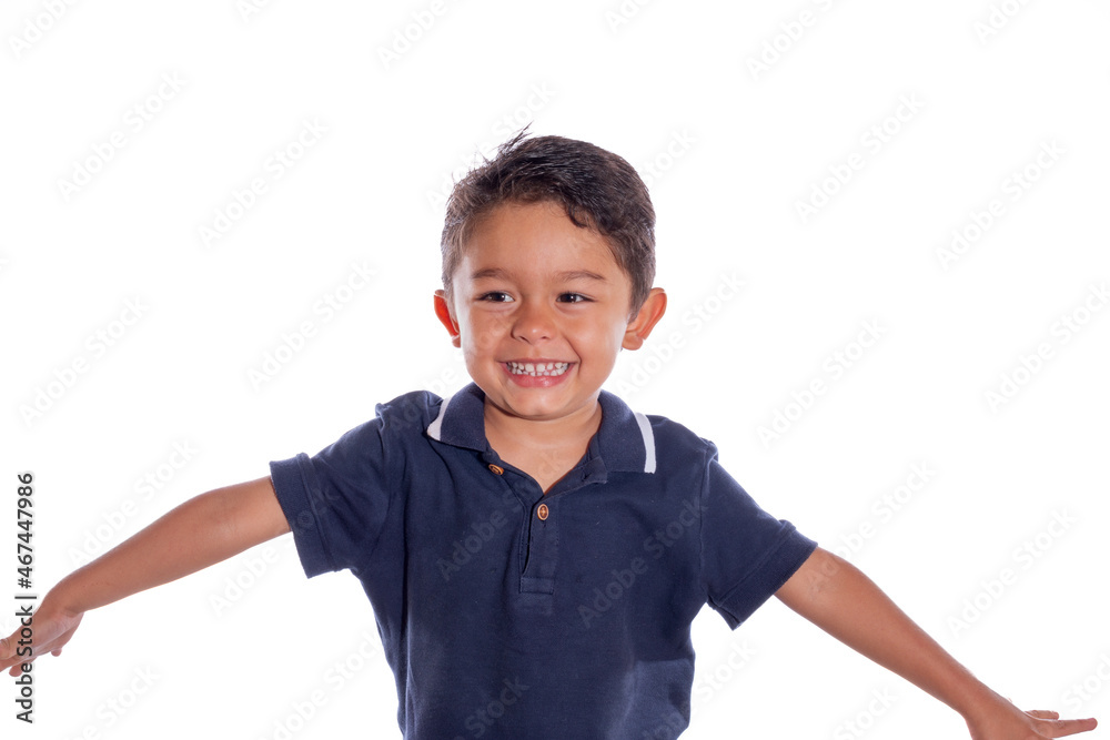 Child laughing. Beautiful latin boy laughing and opening his arms, isolated on white background. Child laughing. Beautiful latin boy laughing and opening his arms, isolated on white background.