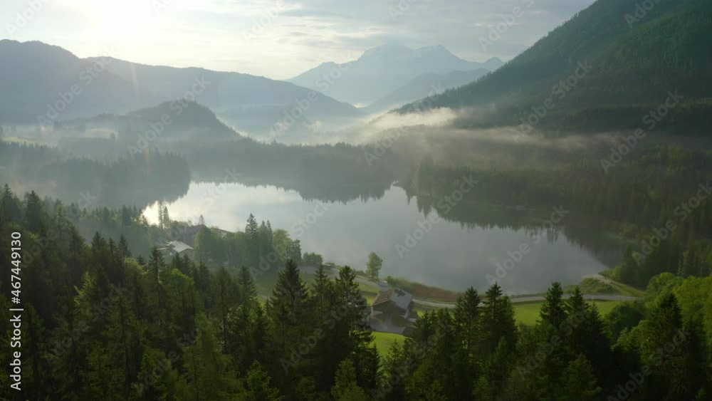 Aerial: Scenic View Of Famous Hintersee Lake Amidst Green Landscape, Drone Flying Forward Towards Cottages On Green Landscape Aerial: Scenic View Of Famous Hintersee Lake Amidst Green Landscape, Drone Flying Forward Towards Cottages On Green Landscape