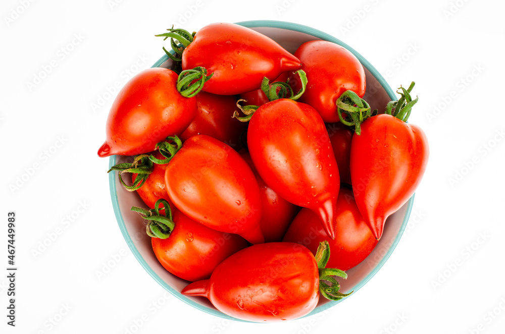 Red ripe oval tomatoes. Studio Photo. Red ripe oval tomatoes. Studio Photo.