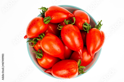 Red ripe oval tomatoes. Studio Photo.
