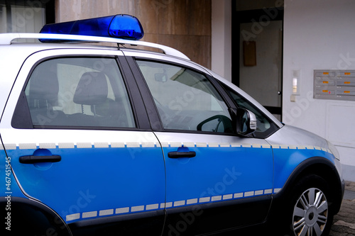 close-up of typical police vehicle in germany with blue flashers in city, used by the police to patrol streets, squares, public places, as well as promptly respond to incidents