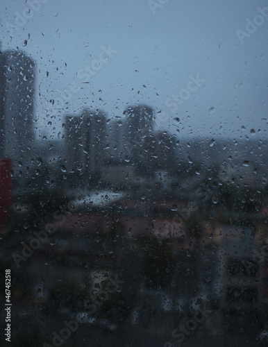 View from a hotel window with raindrops on it