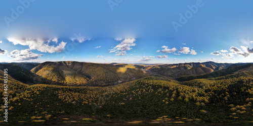 Panorama, Aerial view of Peak Mountain Range, Autumn, Colorful Yellow and Green Forest in Sunset, Russia, Bureinsky ridge, Kholdomi
