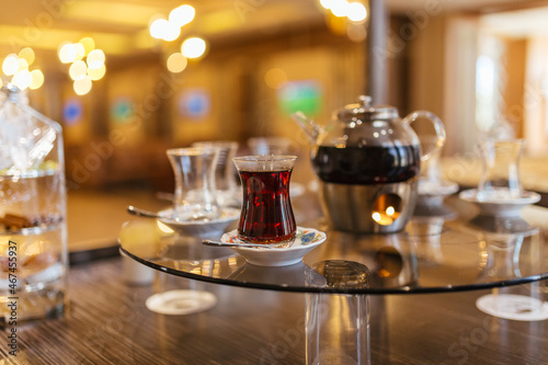 Glass Cup of turkish tea served in traditional style 