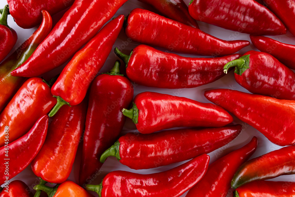 background of fresh red pepper, raw vegetables