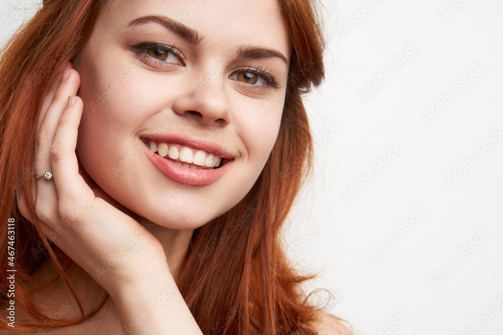 beautiful woman red hair decoration cosmetics close-up beautiful woman red hair decoration cosmetics close-up