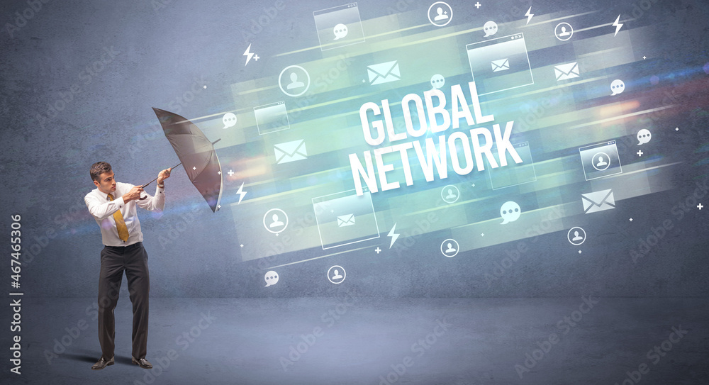 businessman defending with umbrella concept