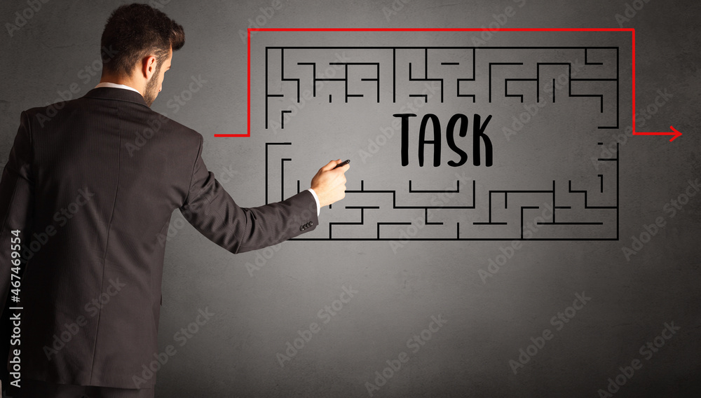 businessman drawing maze concept businessman drawing maze concept