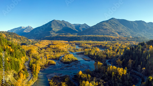 Aerial view of the Vedder Crossing in fall color in Chilliwack city, where the Vedder River changes its name to Chilliwack River, British Columbia, Canada