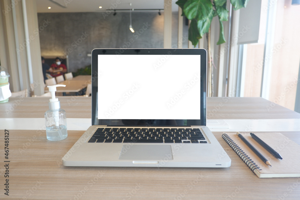 Cropped shot view of the labtop with blank copy space screen for your information content or text message on the gray granite at the modern place Cropped shot view of the labtop with blank copy space screen for your information content or text message on the gray granite at the modern place