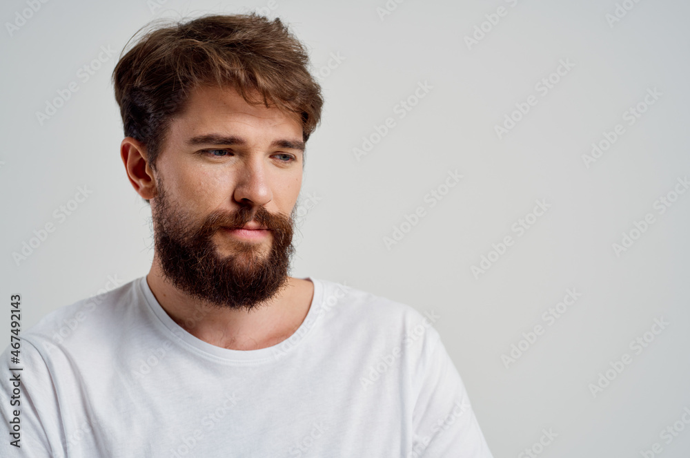 bearded man pain in the neck health problems massage therapy light background bearded man pain in the neck health problems massage therapy light background