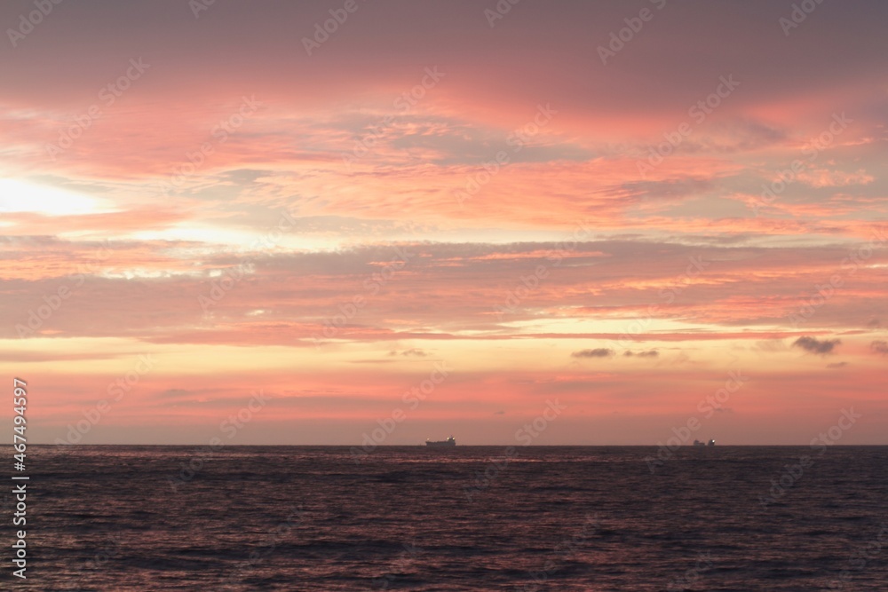 horizon from the seashore during golden hour in the evening horizon from the seashore during golden hour in the evening