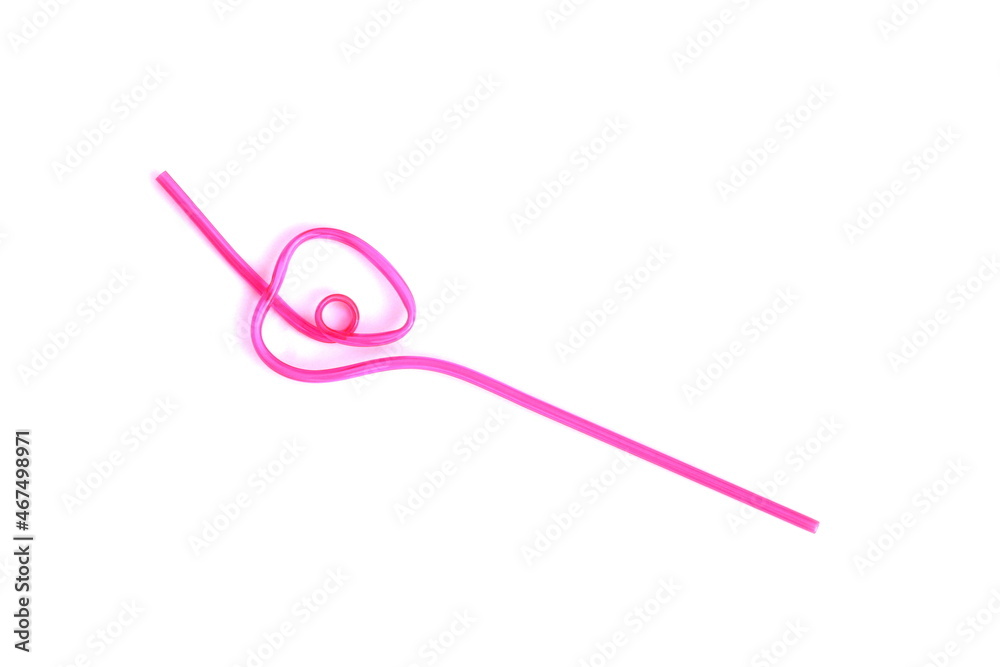 Pink patterned cocktail pipe lies on a white isolated background. Pink patterned cocktail pipe lies on a white isolated background.