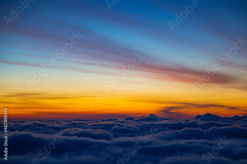 Describe the sky in the morning light.  © Athisakrit