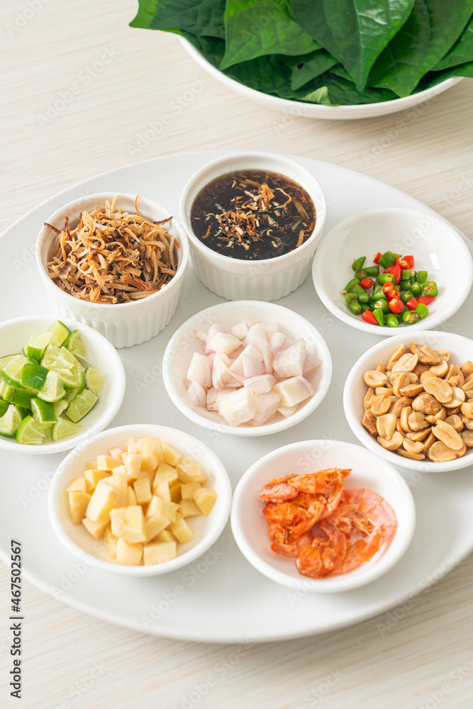 Miang kham - A royal leaf wrap appetizer Miang kham - A royal leaf wrap appetizer