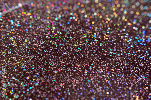Dark Blurred glitter background. Festive lights. New Year background