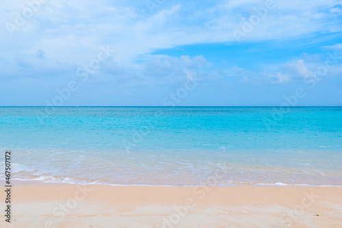 Beautiful tropical beach with clear blue sky and blue clear ocean at Hateruma Island  Okinawa  Japan. Very sunny day with nobody in the sight. Beach with waves