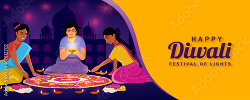 Indian women in traditional clothes making flowers and Diya lamps Rangoli on Diwali Festival