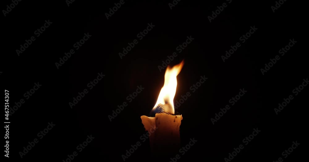 Burning torch on a black background at night Burning torch on a black background at night