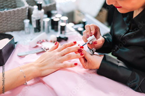 Unrecognizable woman getting her nails done at the beauty salon