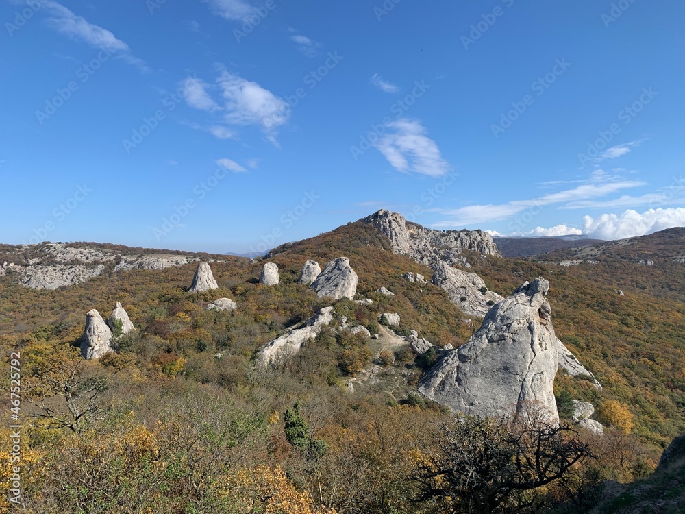 Temple of the Sun, Stones in Crimea. Mysticism place in the autumn day from Mount Ilyas-Kaya. rocks in the forest
