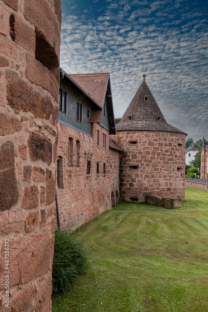 old city wall with defense tower of buedingen in the wetterau district