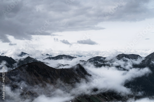 High Mountains in the clouds skyline © Annatamila