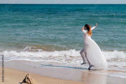 woman silhouette white dress walk beach freedom travel