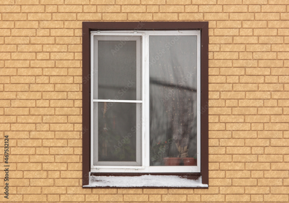 A window in a brick house.