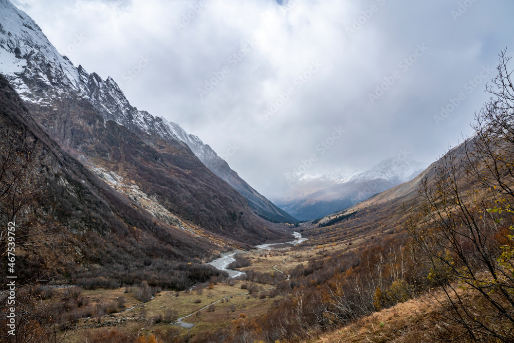travel, walk, autumn, october, cloudy day, nature, landscape, panorama, mountain gorge, valley, mountains, snowy peaks, vegetation, rocks, fog, road, river, streams, water, distance, expanse, horizon