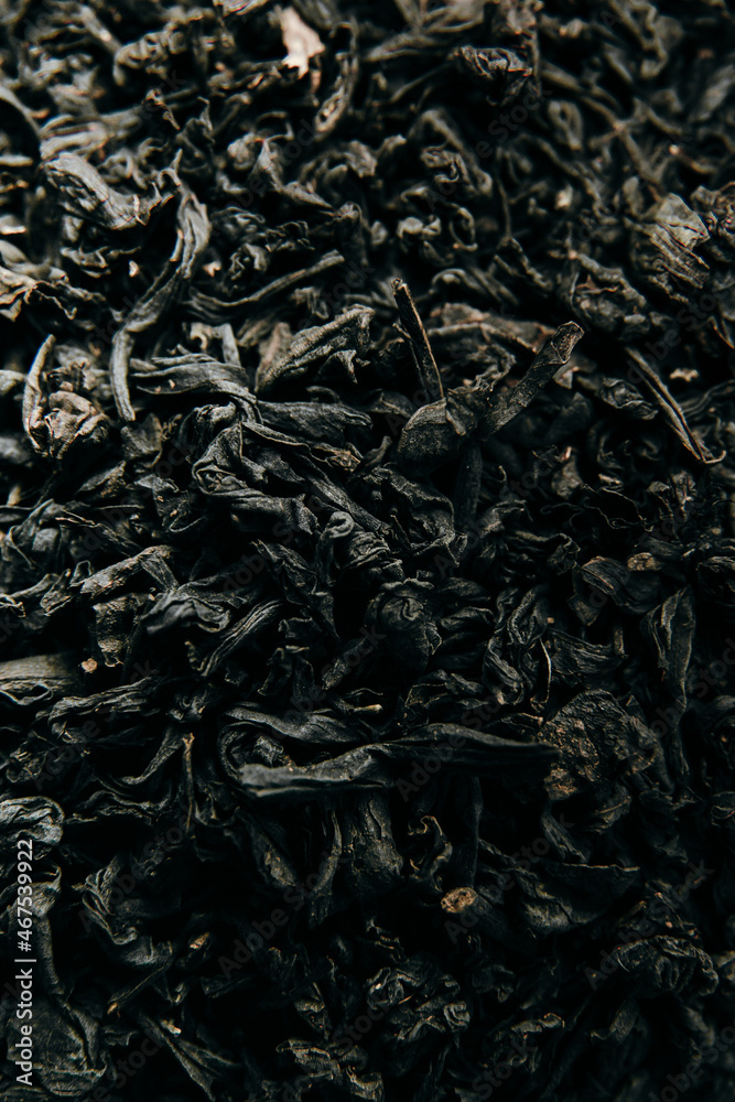 Heap of healthy organic black tea leaves, tea background Heap of healthy organic black tea leaves, tea background
