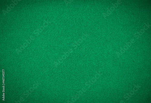 Green cloth of the gambling table. Green background.
