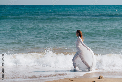 beautiful woman white dress walk beach freedom Fresh air