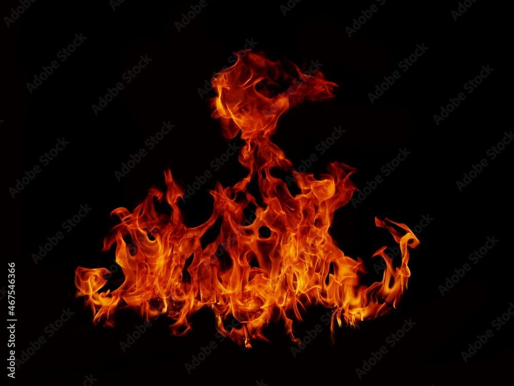 Fototapeta premium Flame Flame Texture For Strange Shape Fire Background Flame meat that is burned from the stove or from cooking. danger feeling abstract black background Suitable for banners or advertisements.