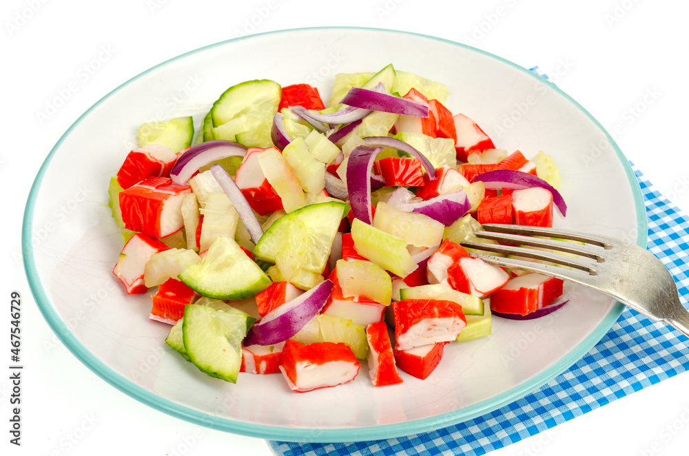 Fresh vegetable salad with crab sticks. Photo
