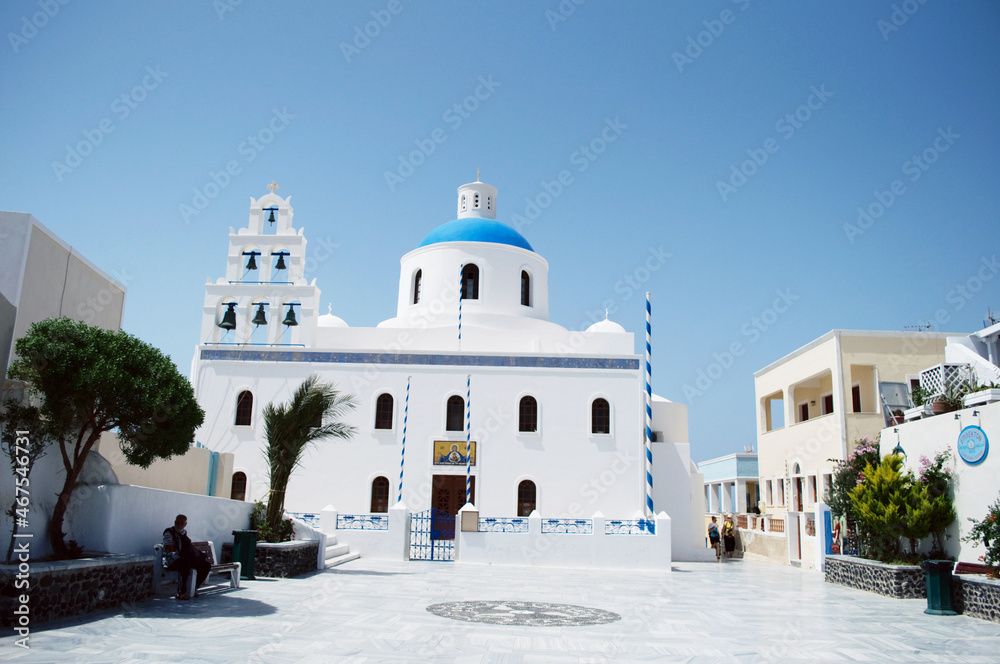 GREECE, SANTORINI: Scenic seaside landscape view of white classics buildings on the rocky slopes of Thira island GREECE, SANTORINI: Scenic seaside landscape view of white classics buildings on the rocky slopes of Thira island